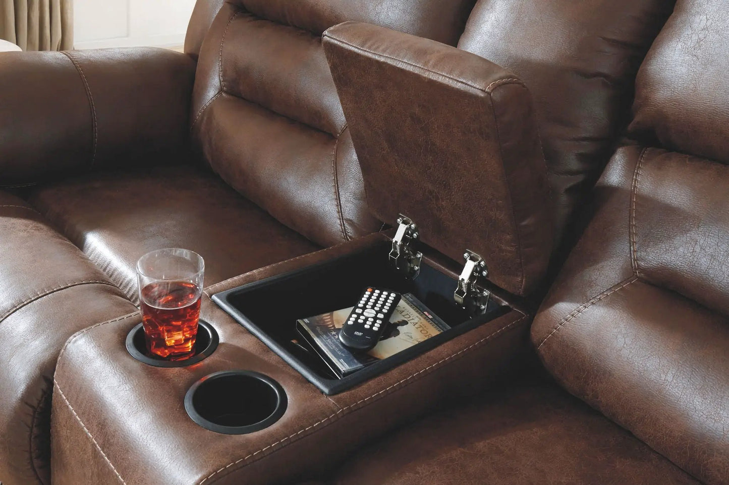 Stoneland reclining living room set in brown leather with center console and cup holders on Tampa Home & Garden Store