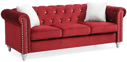 the Raisa Tufted Sofa and Nailhead Accents