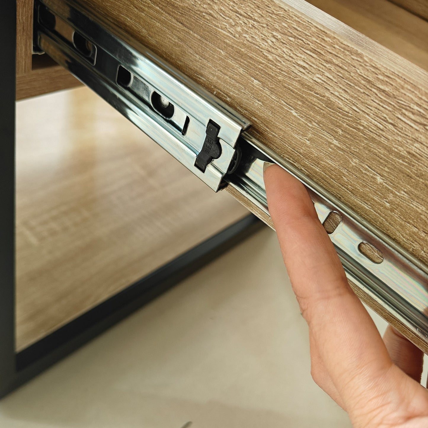 Set of 2 modern end tables with metal drawer slides on light wood veneer surfaces on Tampa Home & Garden Store