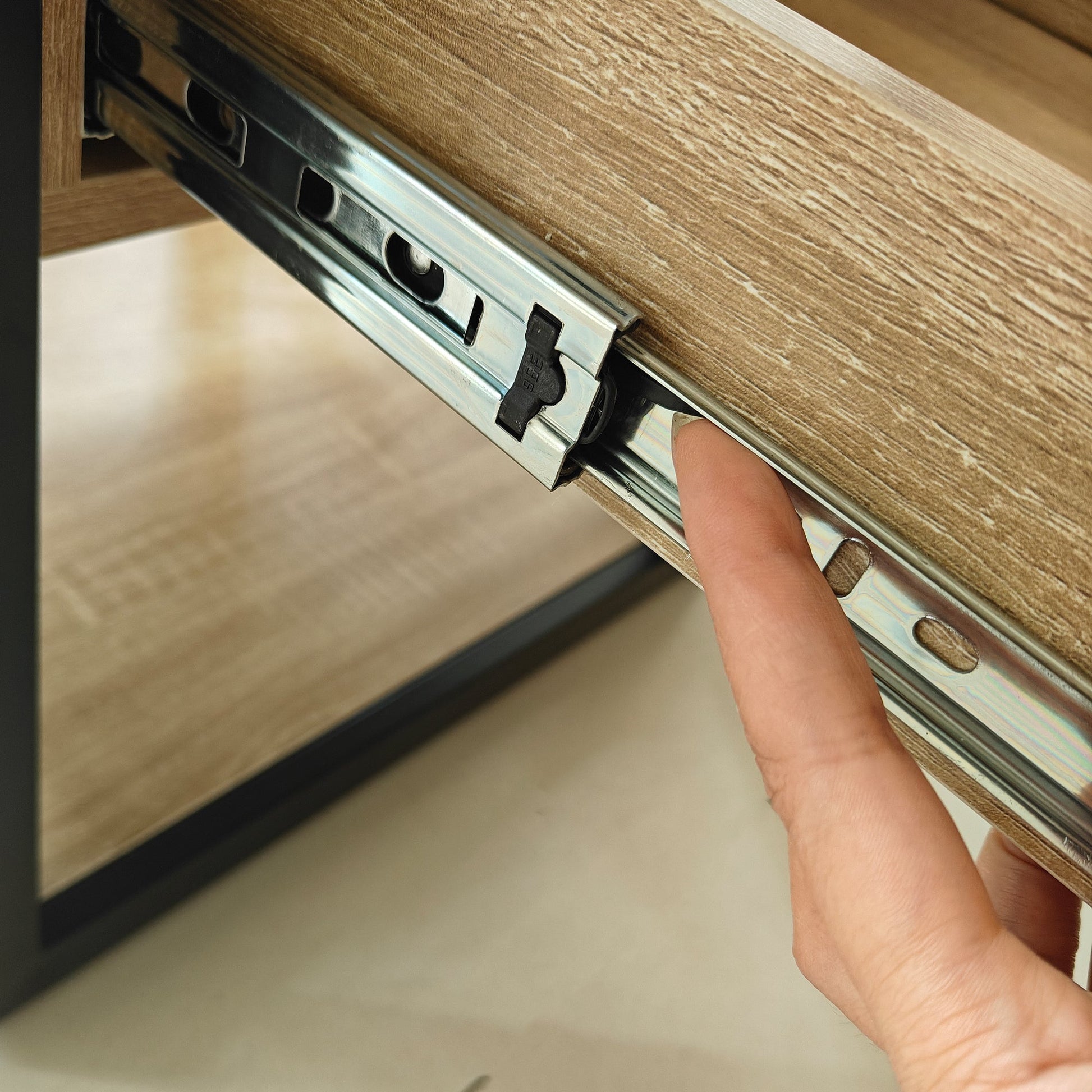 Set of 2 modern end tables with metal drawer slides on light wood veneer surfaces on Tampa Home & Garden Store