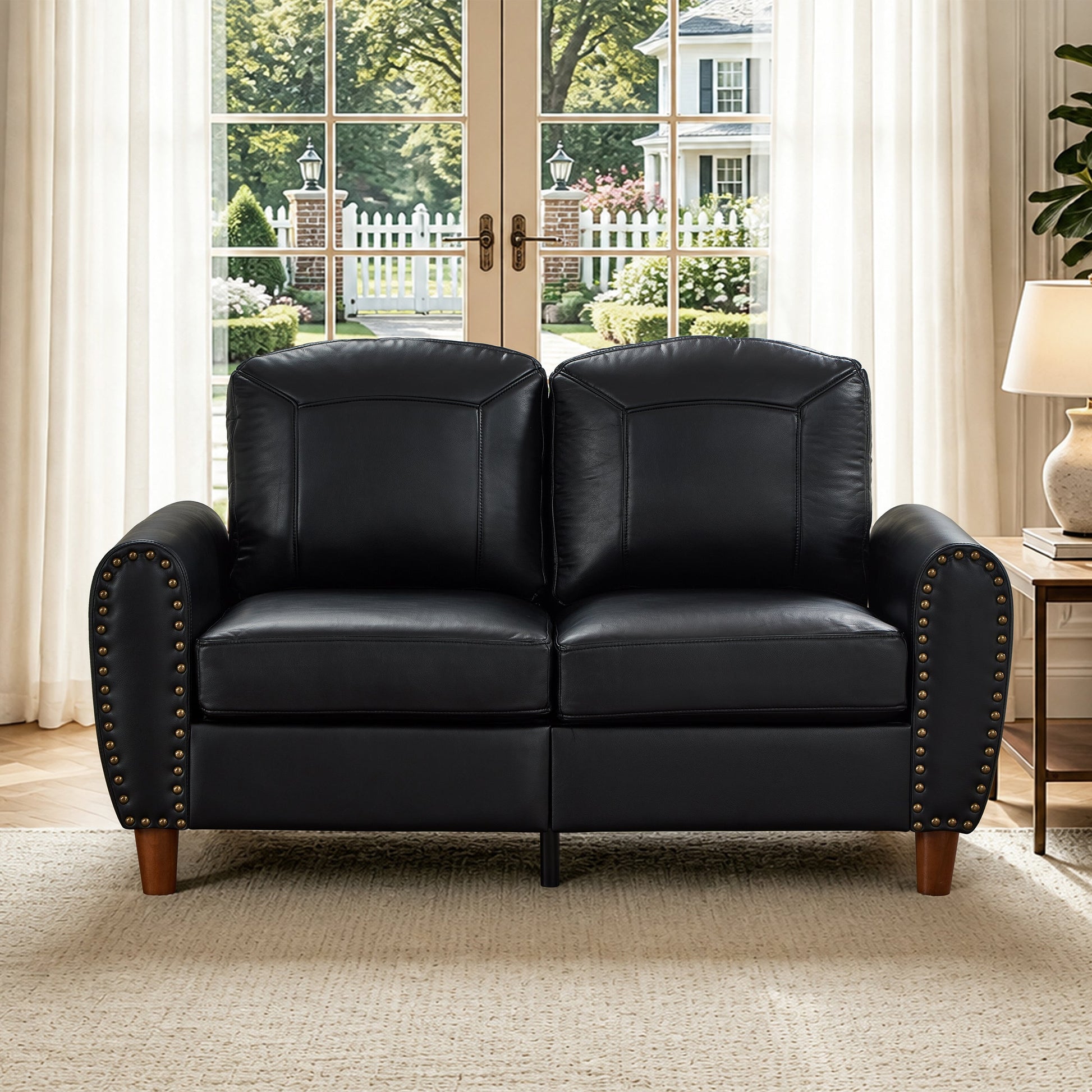 Pair of 59-inch classic faux leather loveseats with nailhead trim and wooden legs in black on Tampa Home & Garden Store