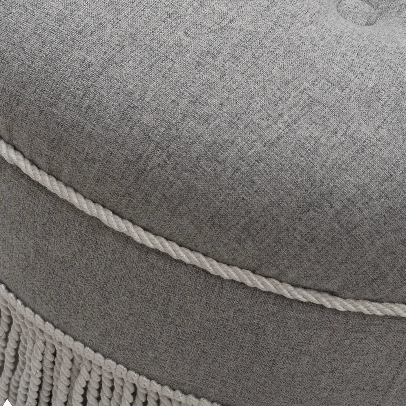 Yolanda round upholstered accent ottoman in gray fabric with white rope trim and fringe on Tampa Home & Garden Store