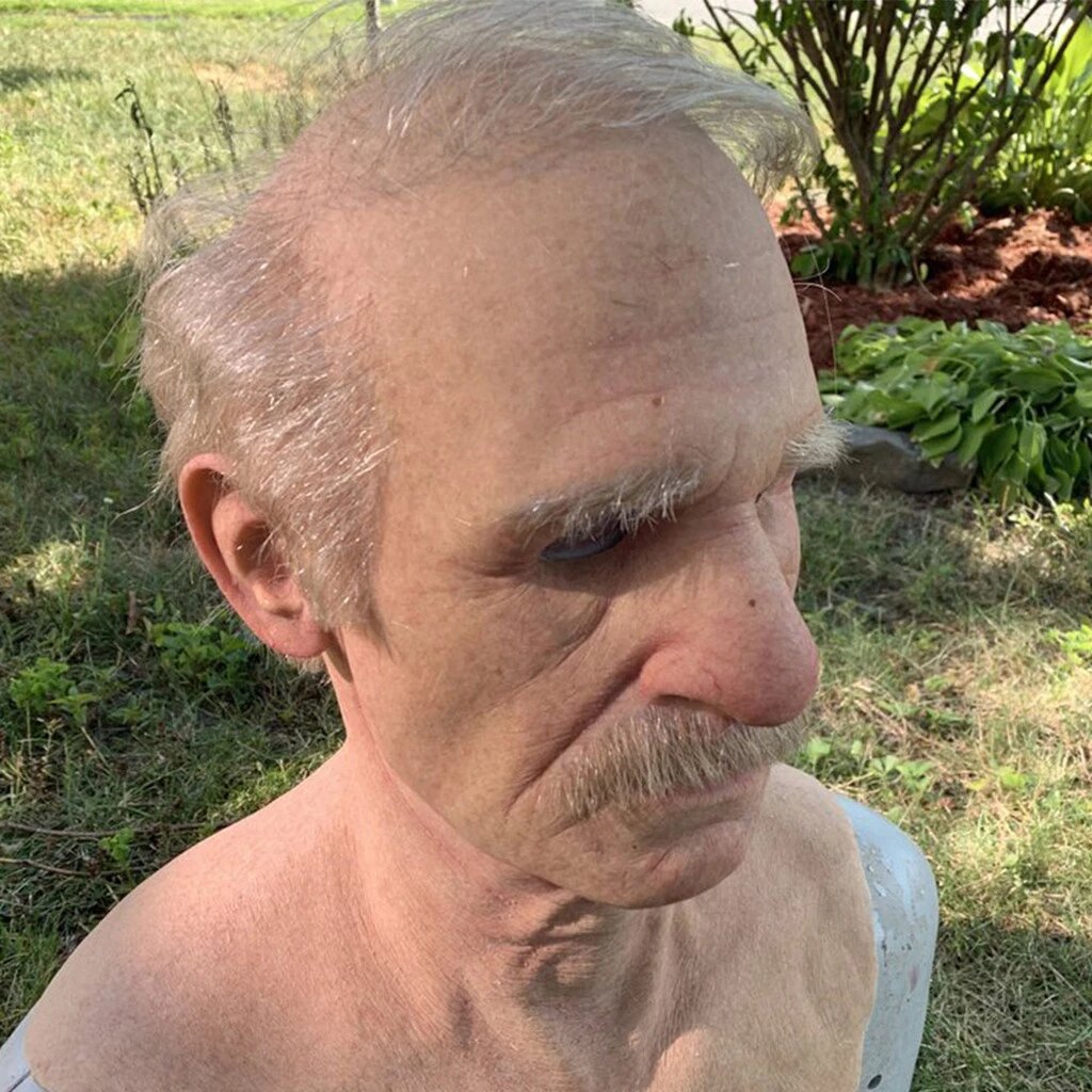Realistic Old Man Halloween Mask Moktan Sabai with pale skin, gray hair, mustache outdoors on Tampa Home & Garden Store