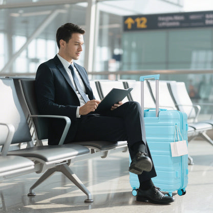 HIFINE Tourist 3-Piece ABS Spinner Wheel Luggage Set blue beside a traveler at airport on Tampa Home & Garden Store