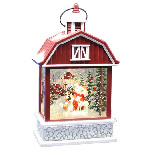 Boule à neige lumineuse tournante - Le Père Noël dans une grange