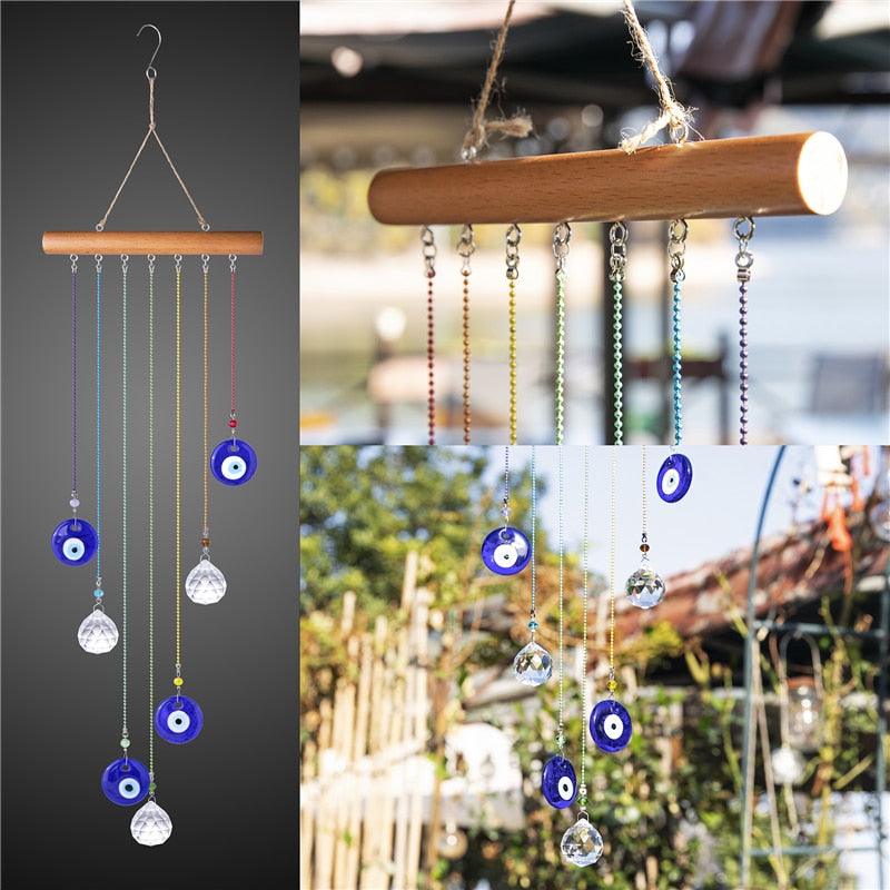 Chakra Energy blue evil eye wind chime with crystal drops and prisms on wood bar by Stevvex on Tampa Home & Garden Store