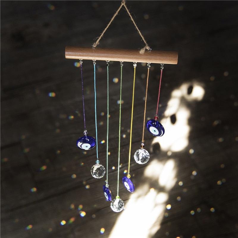 Chakra Energy sun-catcher wind chimes by Stevvex with blue evil eye discs and crystal beads on Tampa Home & Garden Store