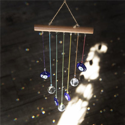 Chakra Energy sun-catcher wind chimes by Stevvex with blue evil eye discs and crystal beads on Tampa Home & Garden Store
