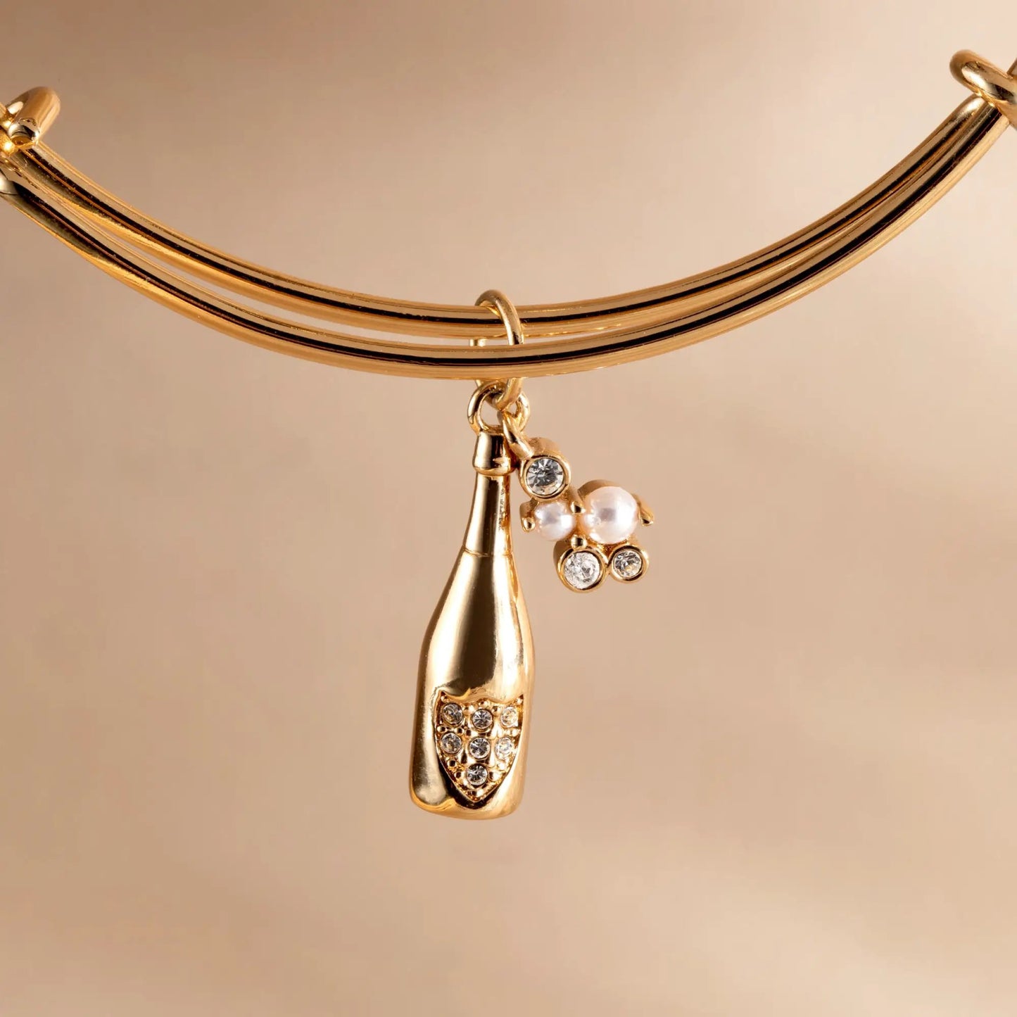Champagne Bangle by ALEX AND ANI, gold-tone triple-band bracelet with crystal pendant on Tampa Home & Garden Store