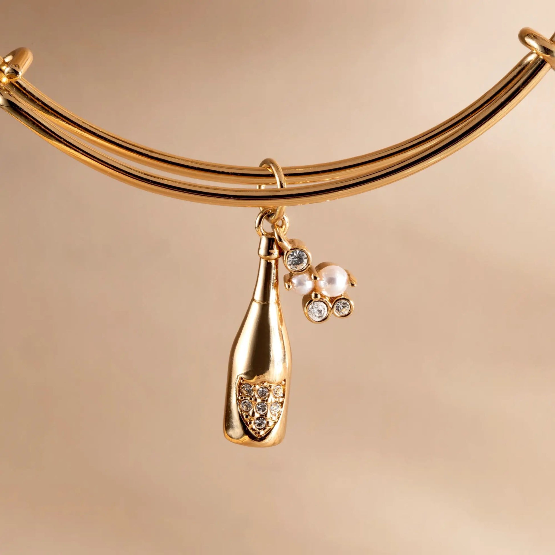 Champagne Bangle by ALEX AND ANI, gold-tone triple-band bracelet with crystal pendant on Tampa Home & Garden Store