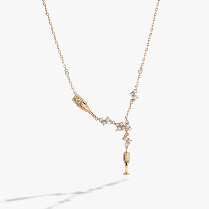 Champagne gold necklace with crystal cone pendant and pearl cluster accents on Tampa Home & Garden Store