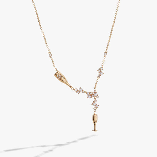 Champagne gold necklace with crystal cone pendant and pearl cluster accents on Tampa Home & Garden Store