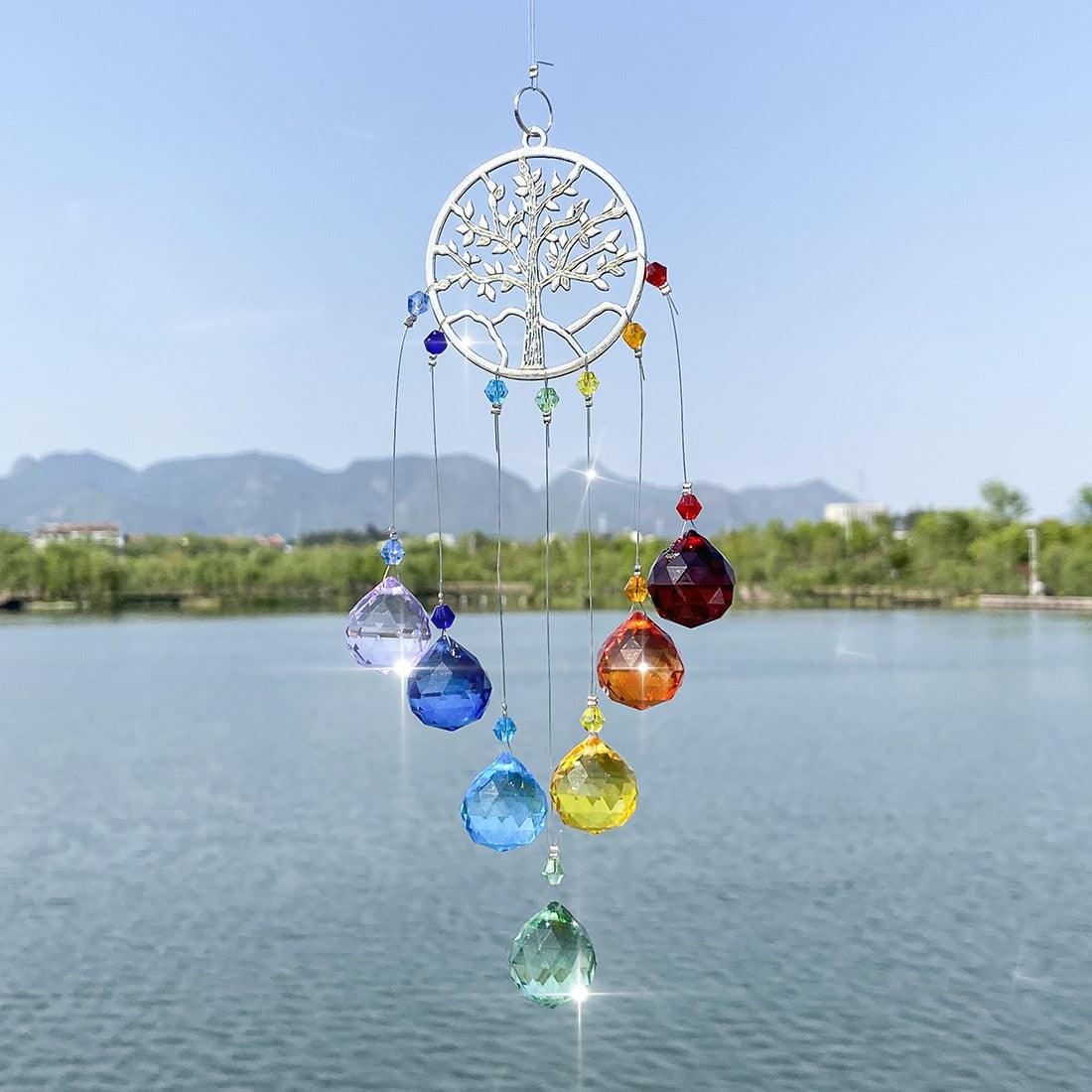 Chandelier wind chimes with rainbow crystal prisms and tree-of-life circle sun catcher on Tampa Home & Garden Store