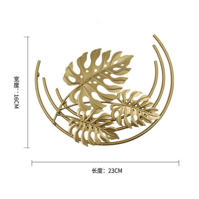 Stevvex gold metal palm leaf suncatcher wind chime with curved ring frame 23cm long on Tampa Home & Garden Store