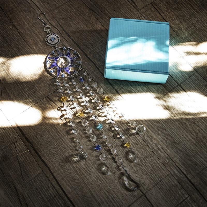 Stevvex chandelier wind chimes sun catcher with Turkish blue evil eye disk and crystal prisms on Tampa Home & Garden Store