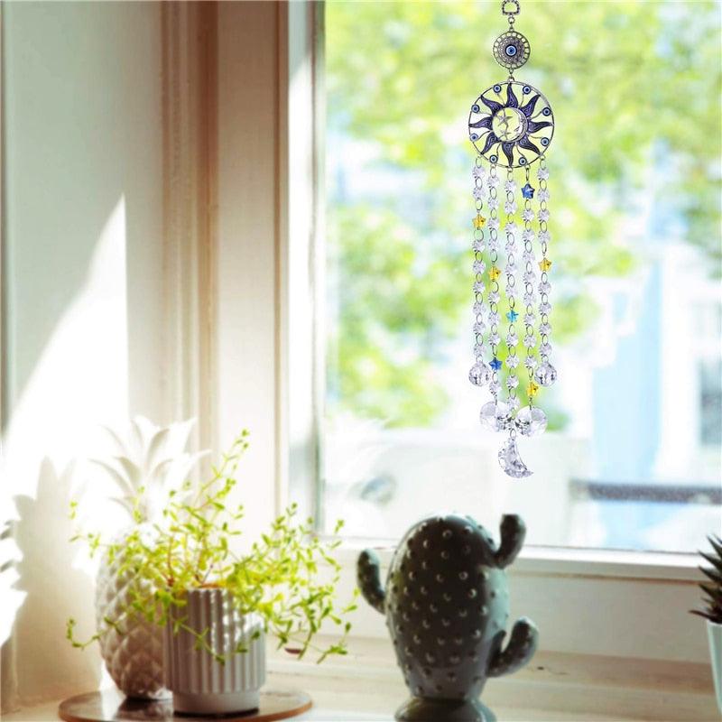Stevvex suncatcher wind chime with Turkish blue evil eye sun motif and crystal prism drops on Tampa Home & Garden Store