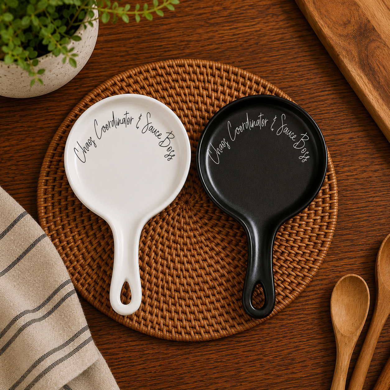 Chaos & Sauce Boss spoon rests Gia Roma white and black pair on woven placemat on Tampa Home & Garden Store