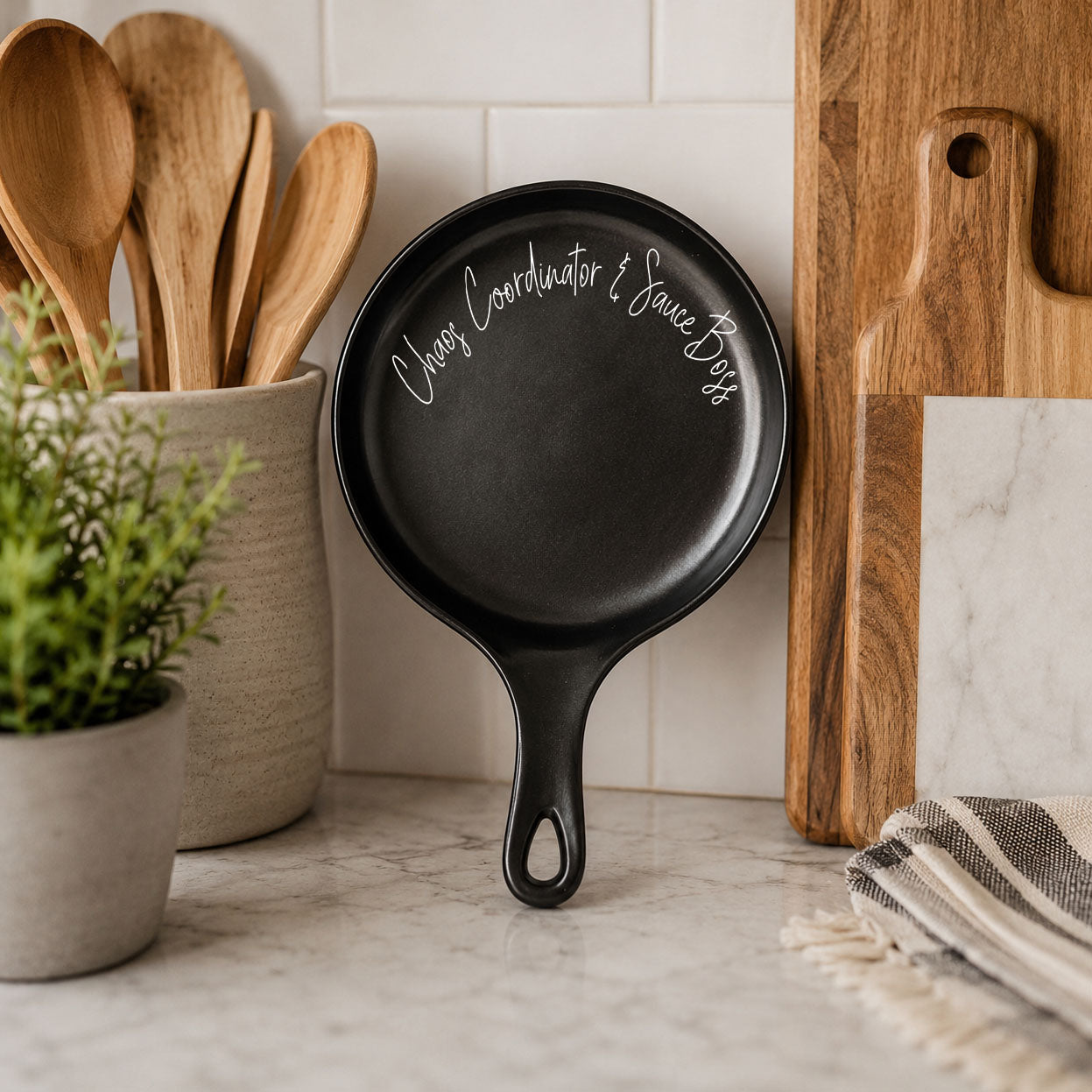 Chaos & Sauce Boss spoon rest by Gia Roma, black pan-shaped kitchen accessory on Tampa Home & Garden Store