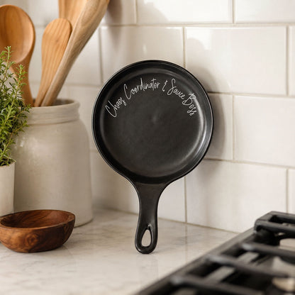 Chaos Coordinator & Sauce Boss spoon rest, black cast-iron kitchen accessory on Tampa Home & Garden Store