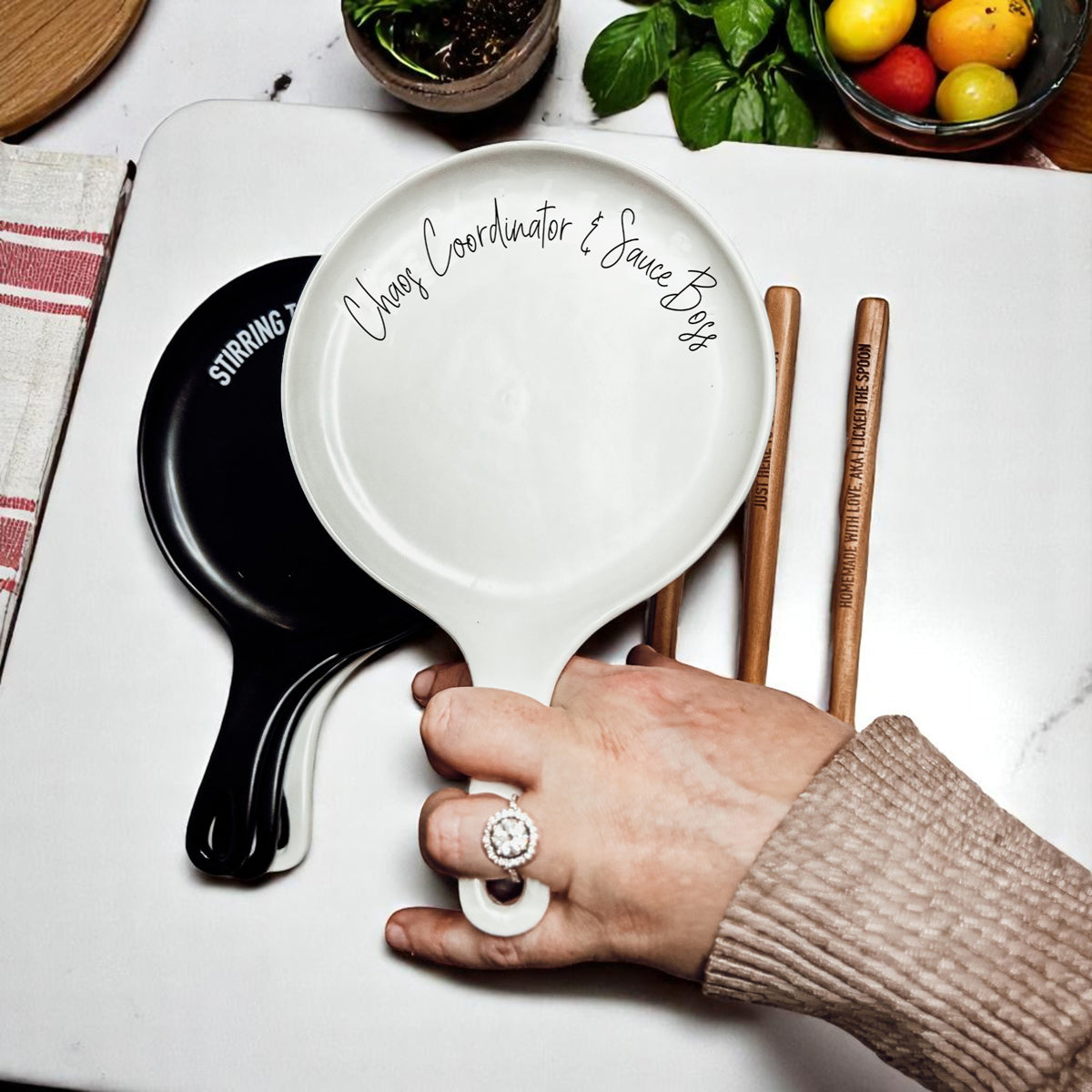 Chaos & Sauce Boss spoon rests, Gia Roma; white round set of 2 with scripted phrase on Tampa Home & Garden Store