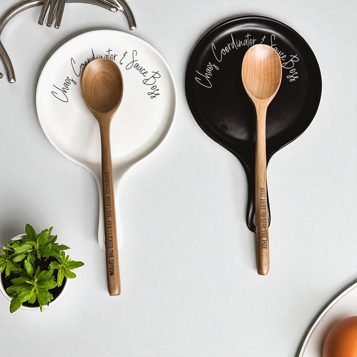 Chaos & Sauce Boss spoon rests by Gia Roma in white and black ceramic with wooden spoons on Tampa Home & Garden Store