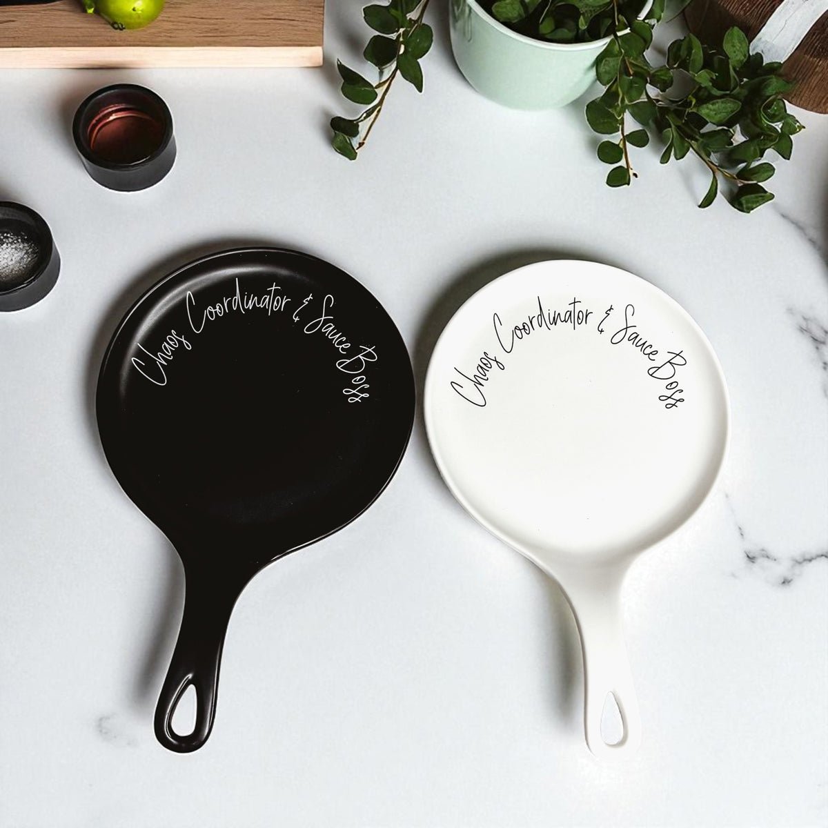 Chaos & Sauce Boss spoon rests, Gia Roma two-piece set in black and white with handles on Tampa Home & Garden Store
