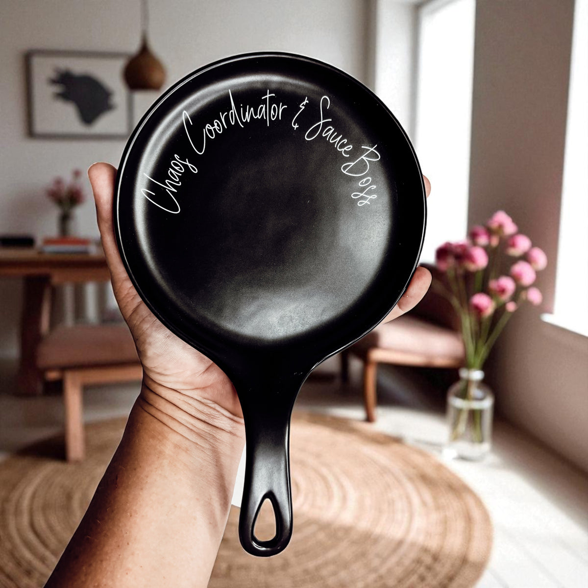Chaos & Sauce Boss spoon rest by Gia Roma, black kitchen accessory with white script on rim on Tampa Home & Garden Store