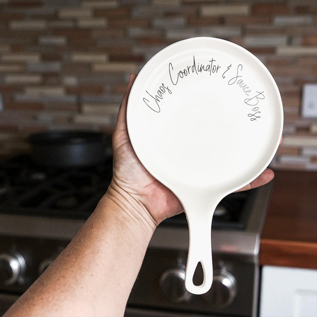 Chaos & Sauce Boss spoon rest by Gia Roma, white ceramic kitchen accessory on Tampa Home & Garden Store