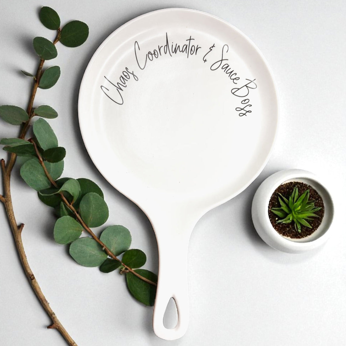 Chaos & Sauce Boss spoon rest by Gia Roma, white ceramic with black script text on Tampa Home & Garden Store