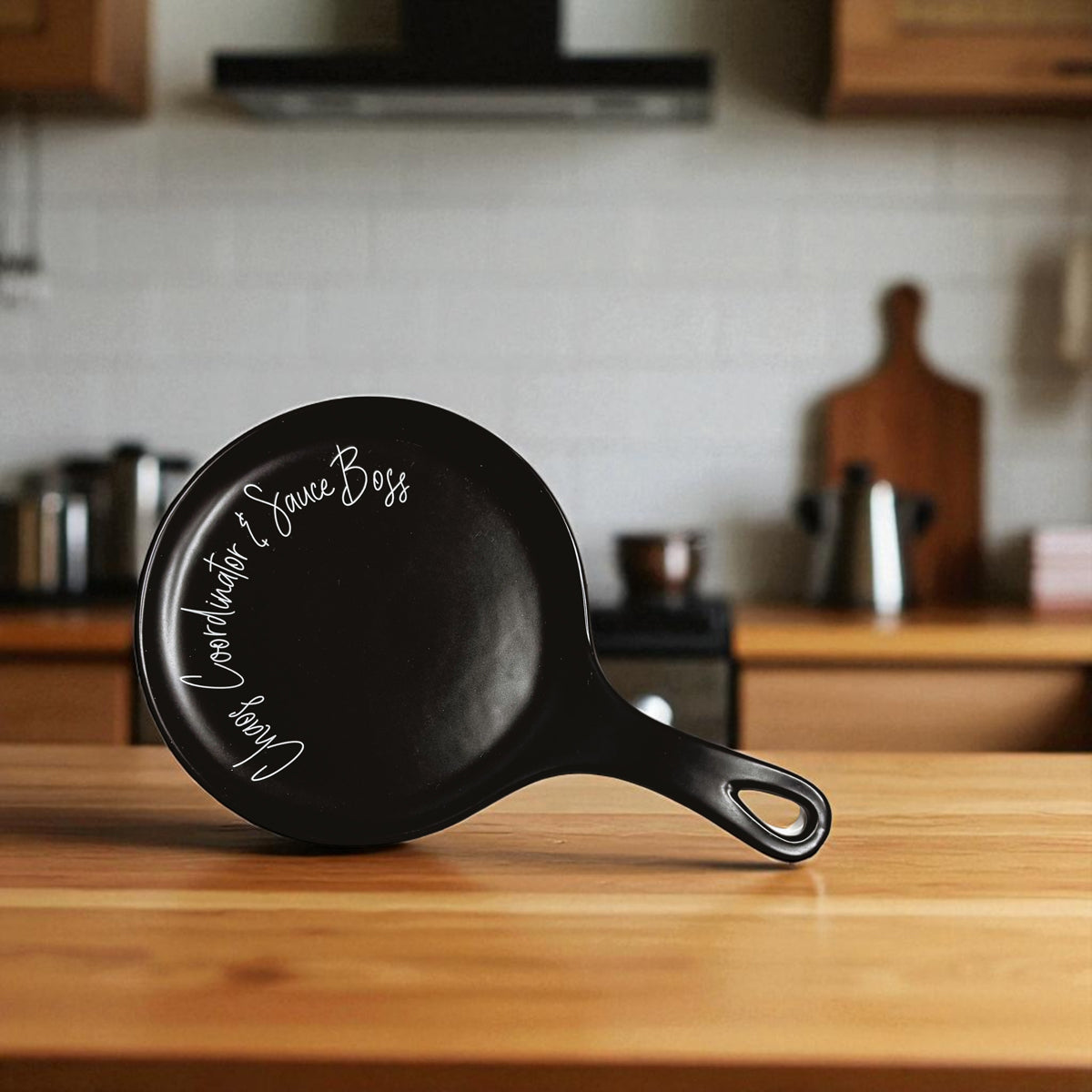 Chaos & Sauce Boss spoon rest by Gia Roma black with white script on Tampa Home & Garden Store