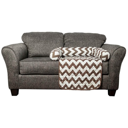 Chevron reversible quilted pet bed chair cover on gray upholstered sofa with brown white chevron quilted blanket on Tampa Home & Garden Store