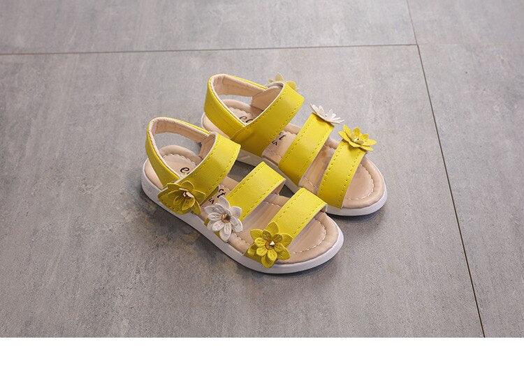 Girls' yellow strappy sandals with flower embellishments open-toe kids footwear on Tampa Home & Garden Store