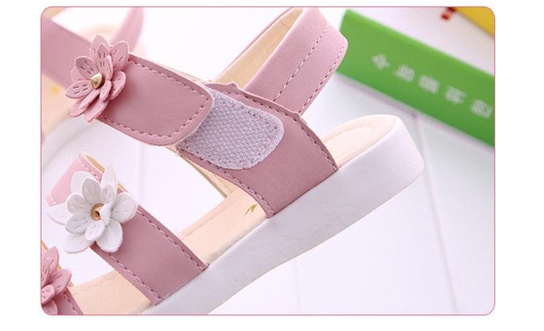 Girls pink flower sandals with open toe, Velcro strap, and decorative flowers for summer on Tampa Home & Garden Store