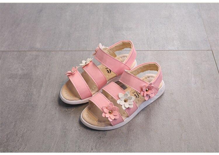 Stevvex kids pink floral sandals with open toe, ankle strap and flower appliqués on Tampa Home & Garden Store