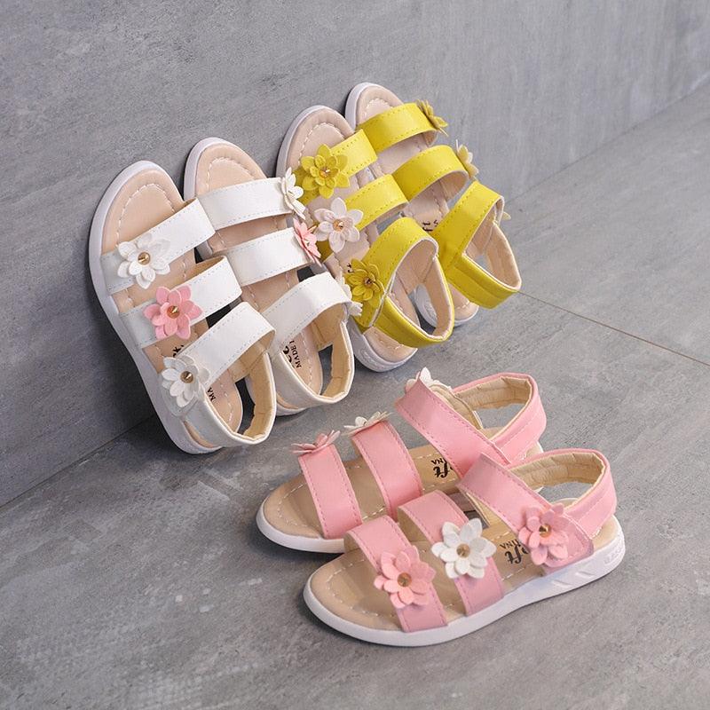 Stevvex girls' summer open-toe sandals set with flower embellishments in white, pink and yellow on Tampa Home & Garden Store