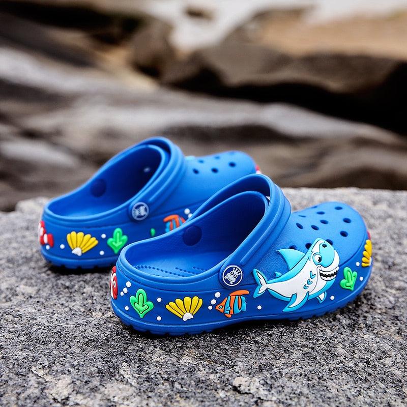Stevvex kids blue cartoon beach slippers pair with shark print and sea decor on Tampa Home & Garden Store