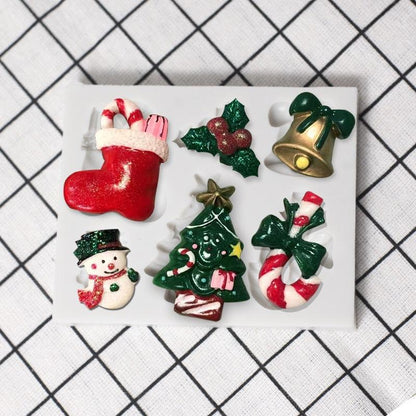 7-piece Christmas silicone mold set with Santa, tree, snowman and bell for fondant decor on Tampa Home & Garden Store