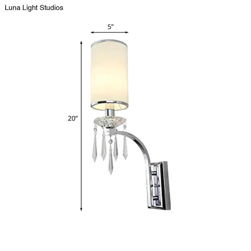 Chrome crystal space-saving wall sconce by Decorbites curved arm and hanging prisms mount on Tampa Home & Garden Store