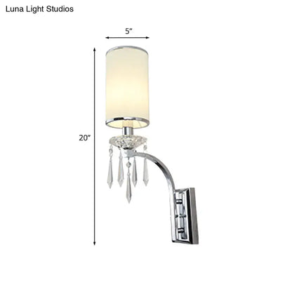 Chrome crystal space-saving wall sconce by Decorbites curved arm and hanging prisms mount on Tampa Home & Garden Store