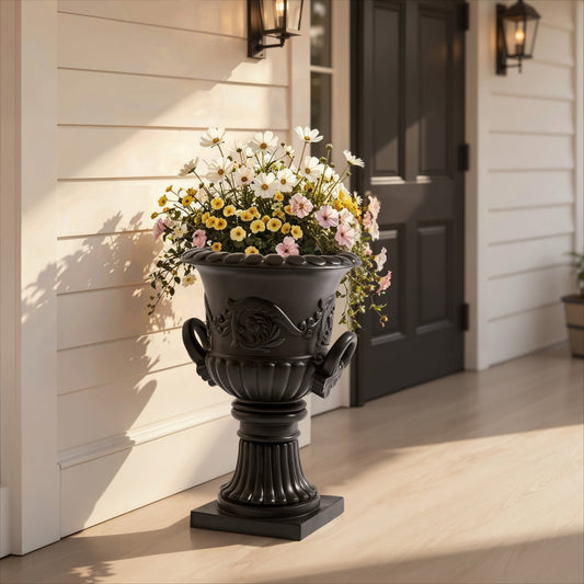 Classical Roman pedestal urn planter in black with embossed floral detailing outdoor on Tampa Home & Garden Store