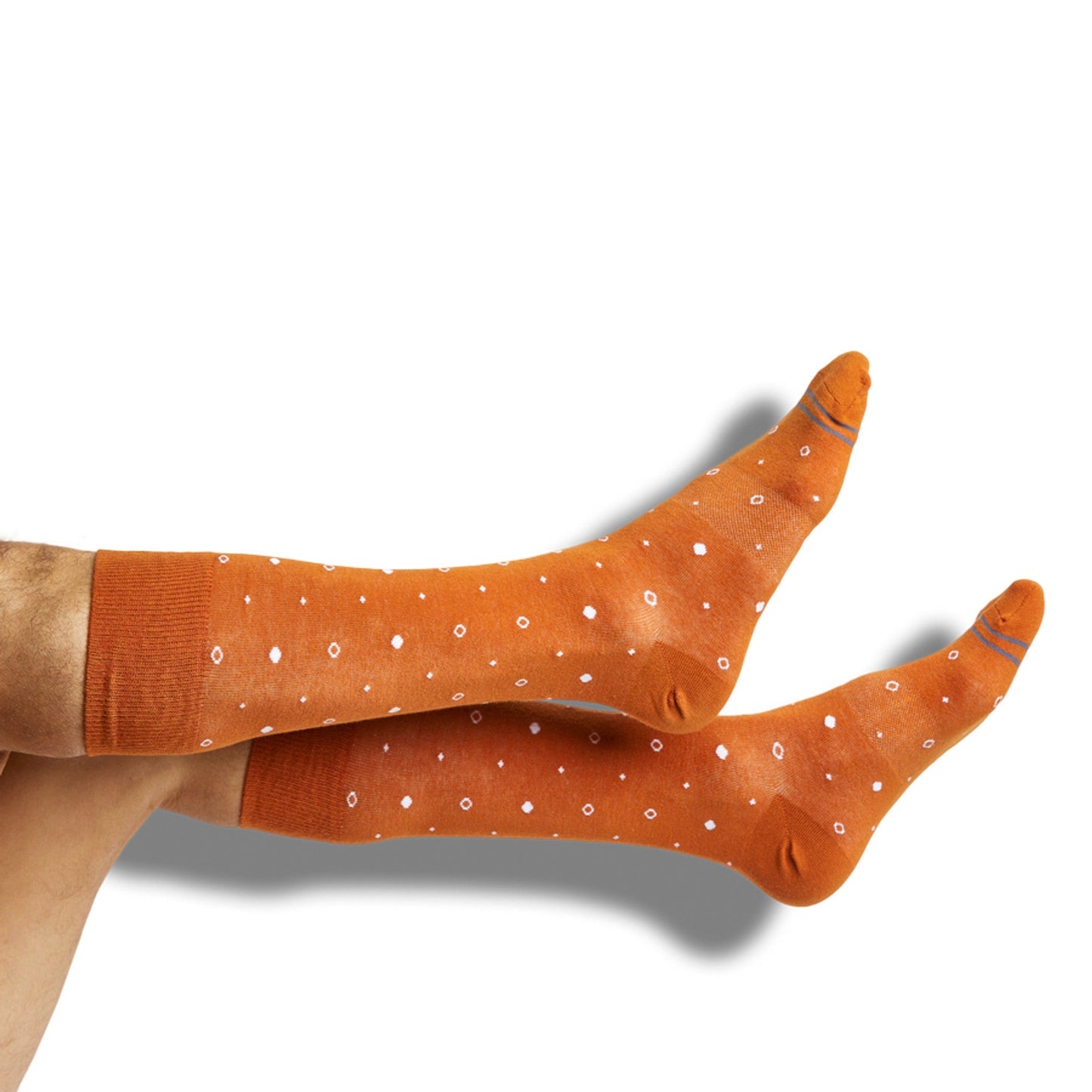 DeadSoxy CiderOrange mixed 4-pack socks orange with white dot pattern, 2 pairs visible on model on Tampa Home & Garden Store