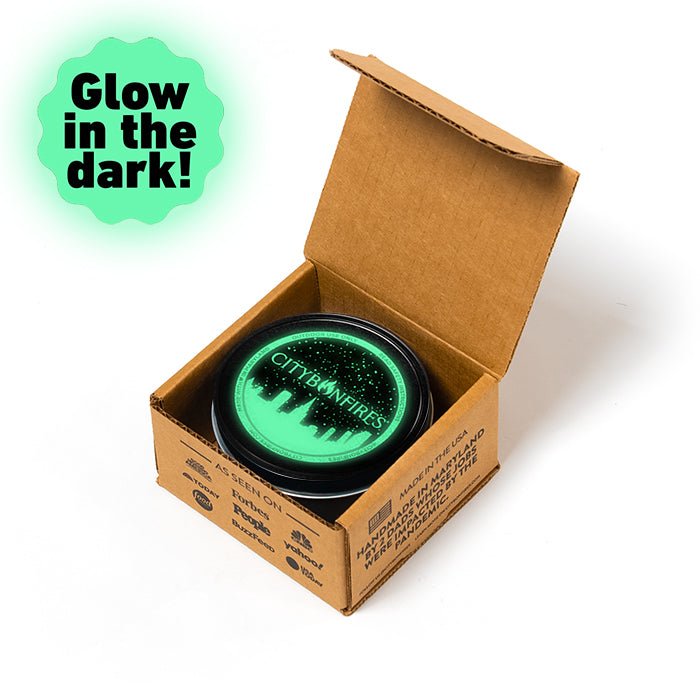 City Bonfires Glow in the Dark candle, outdoor neon green lid, in cardboard box on Tampa Home & Garden Store