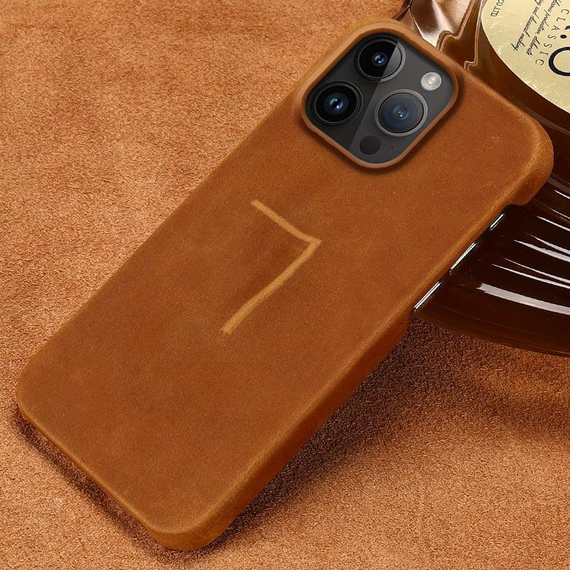 Stevvex brown genuine leather iPhone case with slim bumper, camera cutout visible on Tampa Home & Garden Store