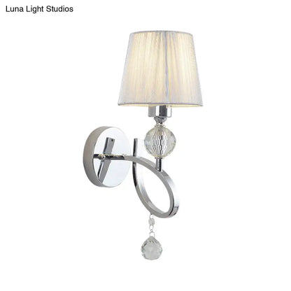 Chrome crystal wall lamp sconce with fabric shade, round backplate, and hanging crystal drop on Tampa Home & Garden Store