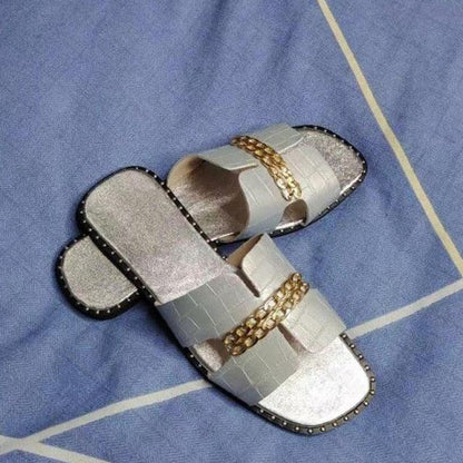 Stevvex flat sandals with double chain straps in metallic silver and black studded sole on Tampa Home & Garden Store