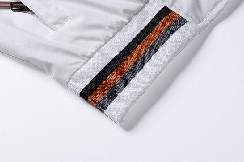 Stevvex windbreaker jacket cuff in light gray with multicolor striped knit band on sleeve on Tampa Home & Garden Store