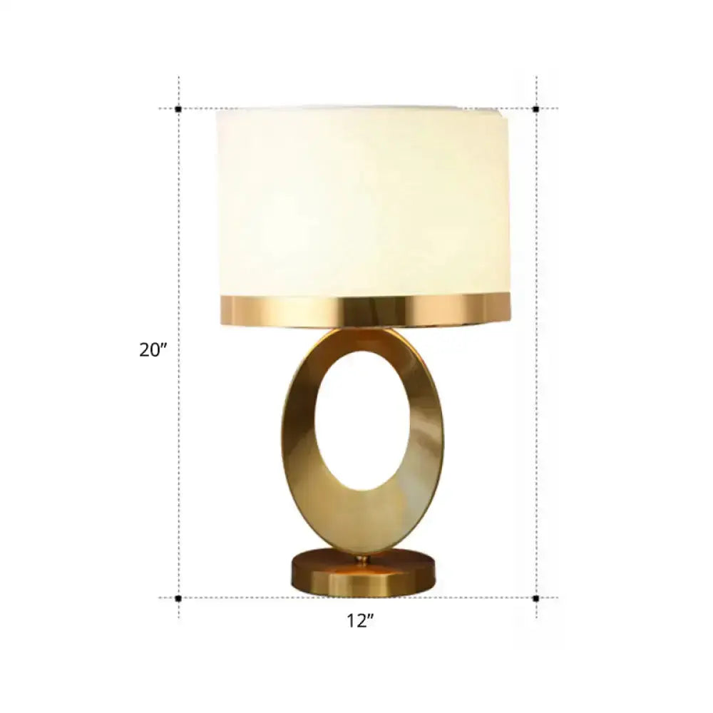 Classic gold oval-base table lamp with drum shade by Decorbites for bedroom lighting on Tampa Home & Garden Store