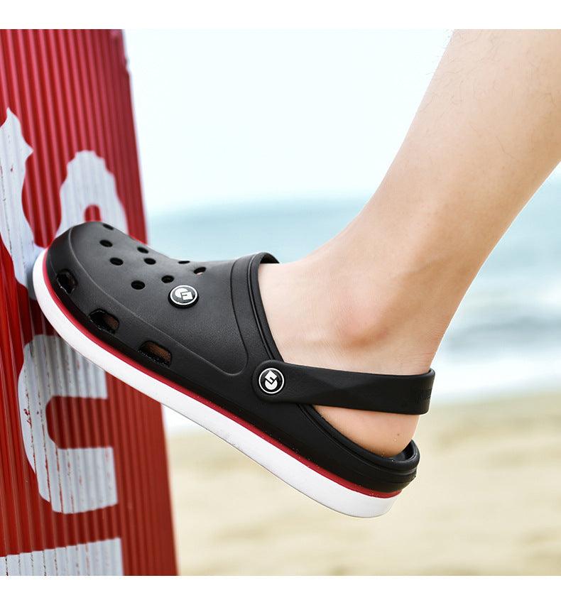 Stevvex men's black perforated clogs with heel strap, white-red sole on beach on Tampa Home & Garden Store