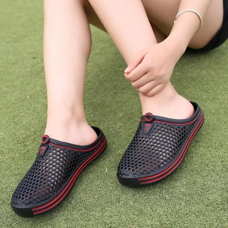 Stevvex black perforated garden clogs pair with red trim, slip-on sandals on Tampa Home & Garden Store