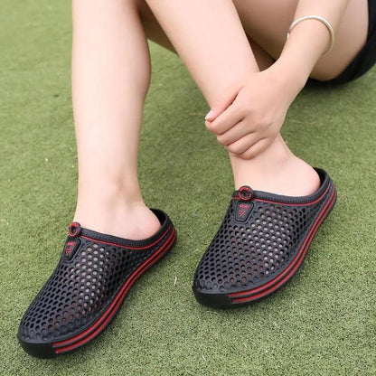 Stevvex black perforated garden clogs pair with red trim, slip-on sandals on Tampa Home & Garden Store